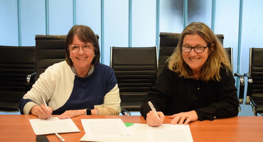 Gladys Ceretta y Silvana Pissano firman acuerdo de cooperación.